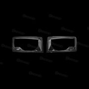 Dry carbon fibre headlight covers installed on Land Rover Defender