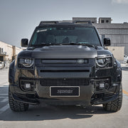 Dry carbon fibre headlight covers installed on Land Rover Defender