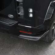 Carbon fiber rear bumper corner covers installed on Land Rover Defender 110