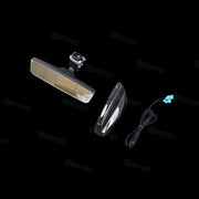 Car mirror and light components on a black background